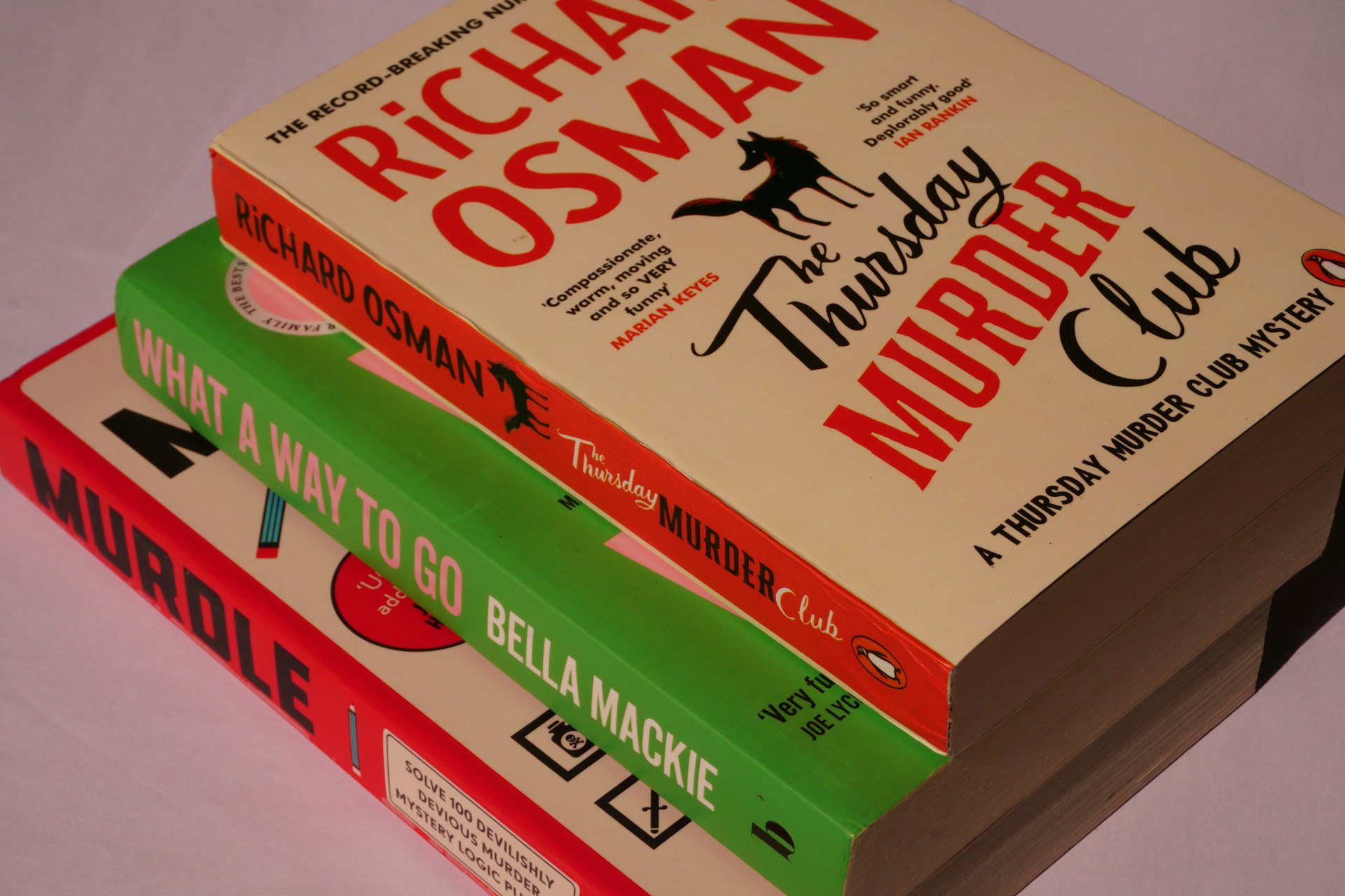 Three books stacked on top of each other